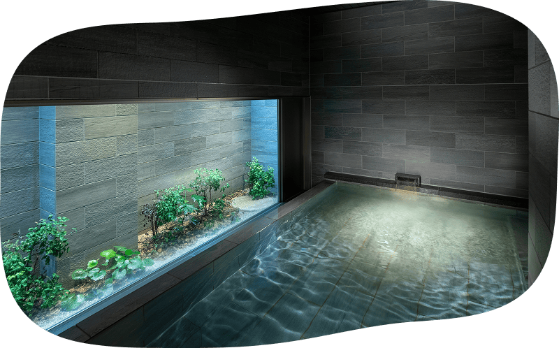 庭を眺めながら、ゆったりお湯に浸かれる大浴場